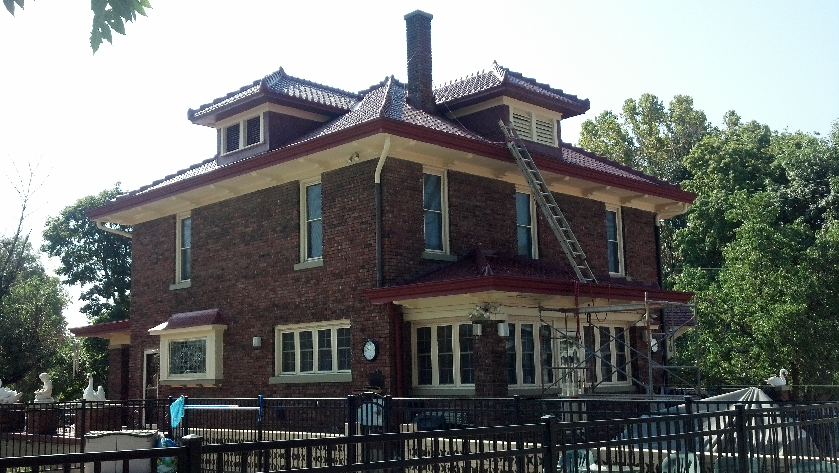 100-year-old historic metal roof after ArmorGarage coating - survived hail storm