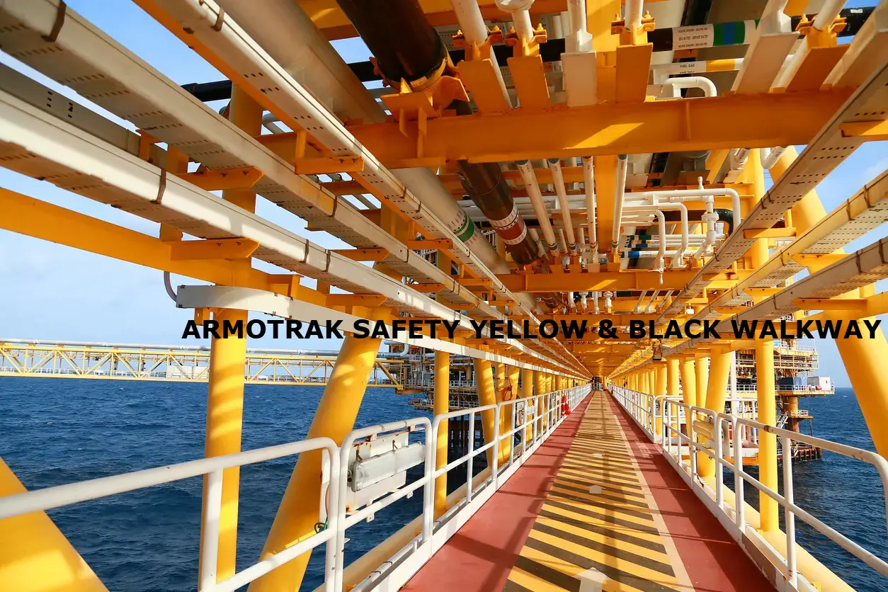 ArmorTrak safety yellow non-slip coating on industrial walkway